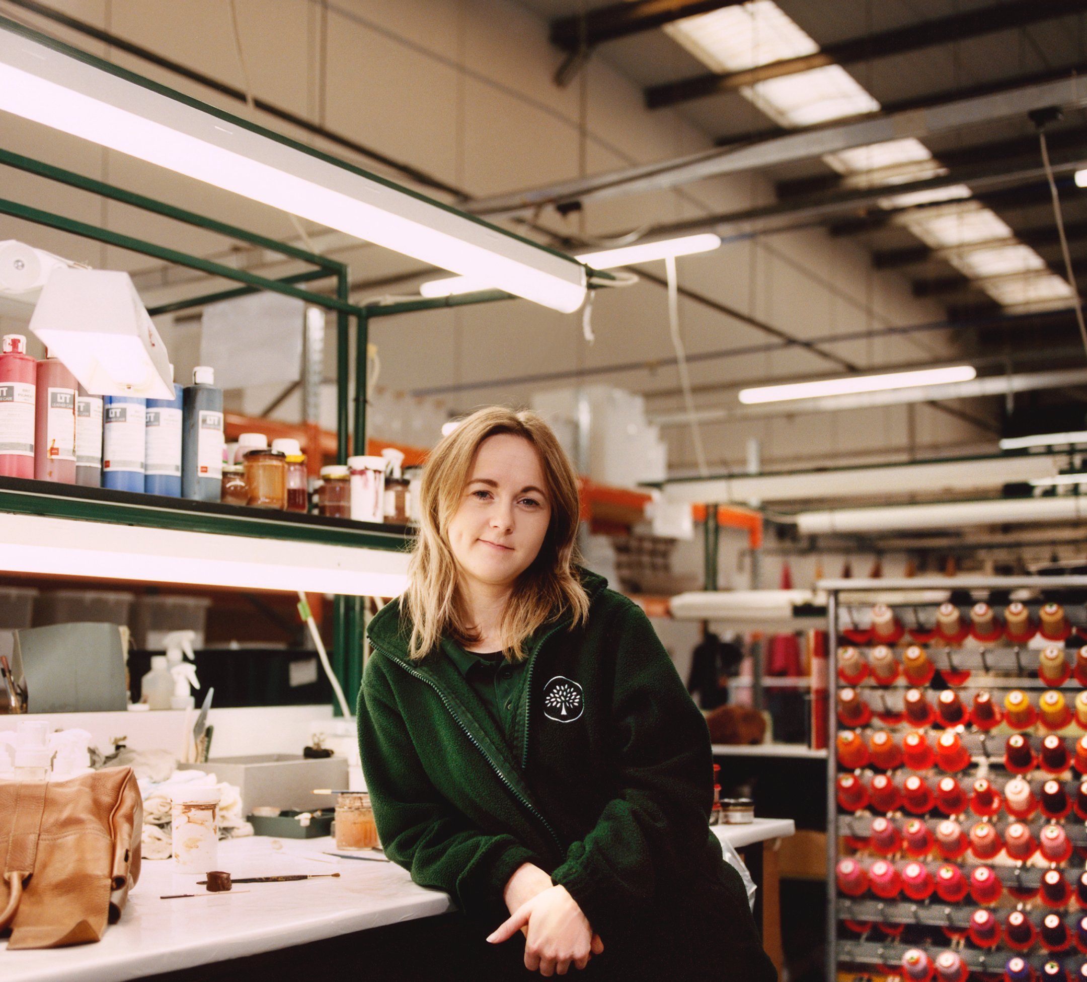 portrait of one member of the mulberry repairs team in a mulberry factory